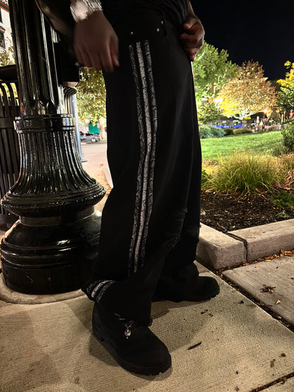 “Fallen Snake” denim jeans